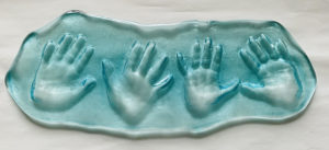 hand prints in glass